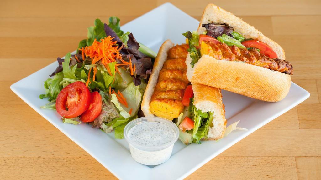 Beef Koobideh · Seasoned ground beef or chicken with lettuce, tomato, pickles, and house dressing. Served in French baguette with a choice of green salad or French fries.