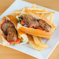 Steak Sandwich · Grilled marinated of filet mignon with lettuce, tomato, onion, pickles, and house dressing. ...