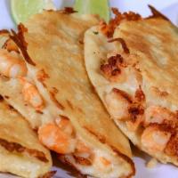 Gobernador Tacos · Popular. Three tacos, handmade tortillas, melted cheese, and shrimp. Served for one.