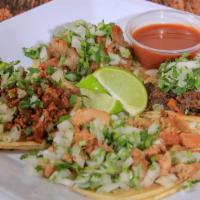 Tacos Al Vapor · Popular. Two small soft corn tortilla, meat: Asada, Cabeza, Chicken, Al Pastor, Carnitas, Bu...