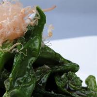 Shishito Peppers · sautéed Japanese shishito peppers, garlic sauce, bonito flakes.