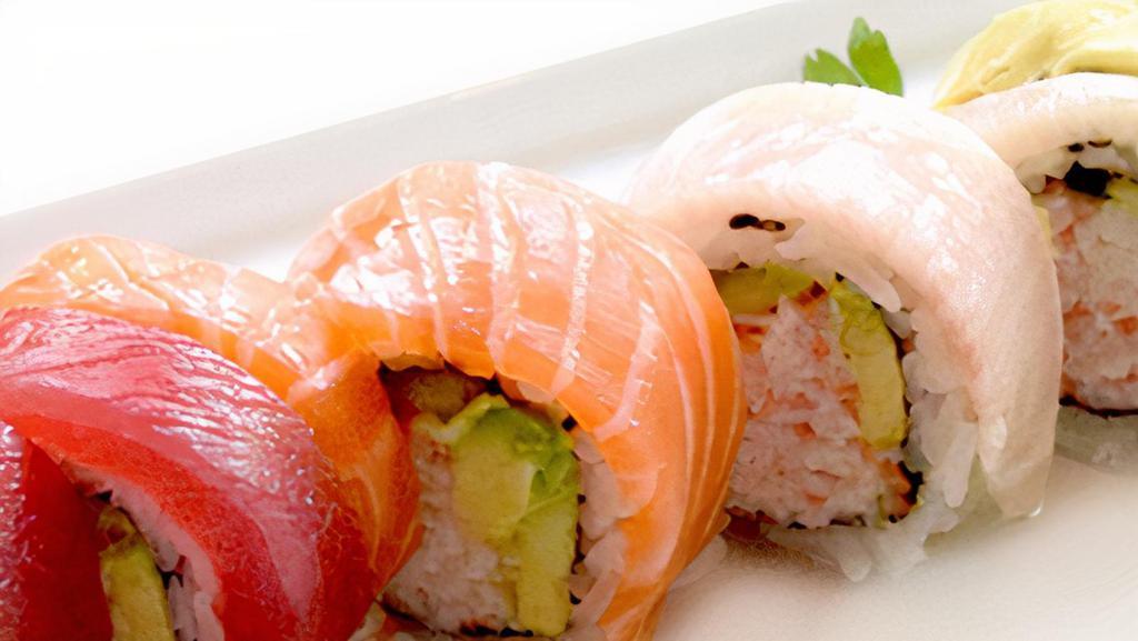 Rainbow Roll · Crab stick,avocado and cucumber inside,with tuna salmon yellowtail and white fish on top