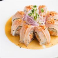 Albacore Crunch Roll · albacore, krab, shrimp tempura, garlic crunch, spicy ponzu sauce.