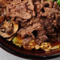 Beef Sukiyaki · thinly sliced beef, vegetables, noodles, tofu, sukiyaki broth.