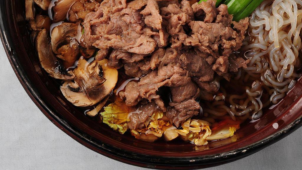 Beef Sukiyaki · thinly sliced beef, vegetables, noodles, tofu, sukiyaki broth.