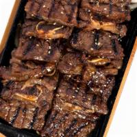 Barbequed Beef Short Ribs · house marinated asian bbq short ribs, charred onion