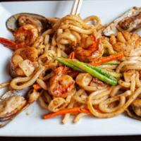 Spicy Seafood Udon Pasta · shrimp, jumbo scallop, calamari, mussels, asparagus, udon noodles.
