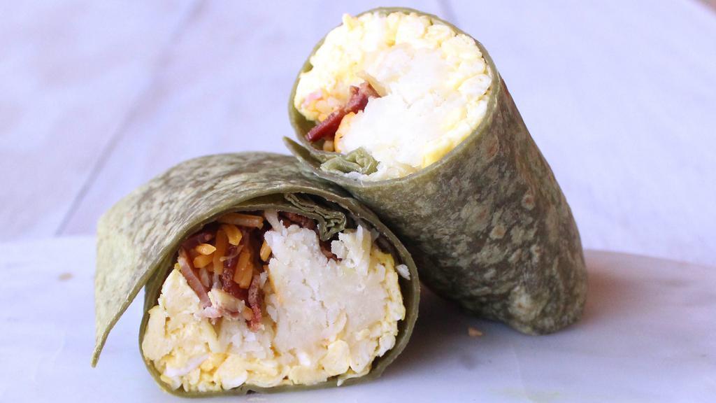 Bacon Breakfast Burrito · Organic Cage-Free Eggs, Natural Pork Bacon, Natural Cheddar Cheese, Organic Hash Browns, Organic Flour Tortilla.