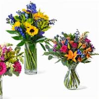 Seasonal Mixed Flower Arrangement Premium  · Beautiful seasonal flowers arranged in a premium vase. 30-35 stems.