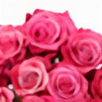 Dozen Long Stem Pink Roses  · Dozen roses wrapped in clear cellophane.