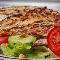 Charbroiled Chicken Salad · Charbroiled chicken breast served over romaine & iceberg lettuce mix, tomatoes, cucumbers, s...