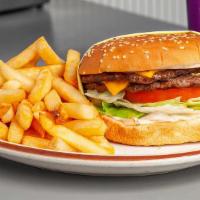 1/2 Lb. Double Burger · Made with 1000 Island dressing, onions, lettuce, tomato and pickles on a white sesame bun