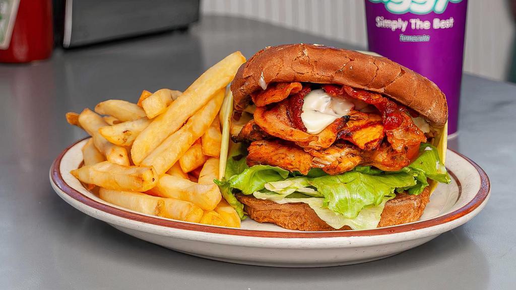Chicken Club Sandwich · Charbroiled chicken breast, mayo, lettuce, tomato, bacon, swiss cheese. on honey wheat bun.