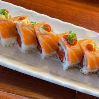 Pink Roll · Medium spicy. In: spicy tuna, cucumber. Out: salmon, masago, green onion with spicy mayo, ho...