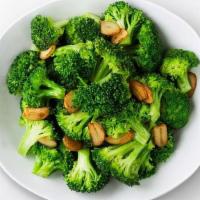 Sautéed Broccoli With Garlic · This Vitamin C-packed supergreen is sautéed over high heat with freshly sliced garlic for si...