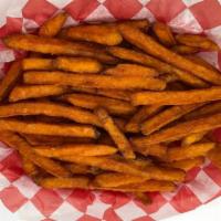 Sweet Potato Fries · Crispy on the outside and tender on the inside.