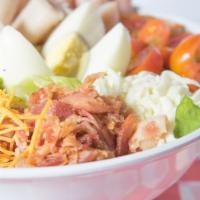 Cobb Salad · Romaine lettuce, ham, turkey, bacon, halved, cherry tomatoes, egg, avocado, red onions, blue...