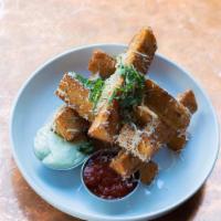 Polenta Fries · Served with balsamic ketchup and gorgonzola sauce.