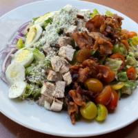 Cobb · Grilled chicken, bacon, avocado, egg, heirloom tomatoes, red onion, gorgonzola, red wine vin...