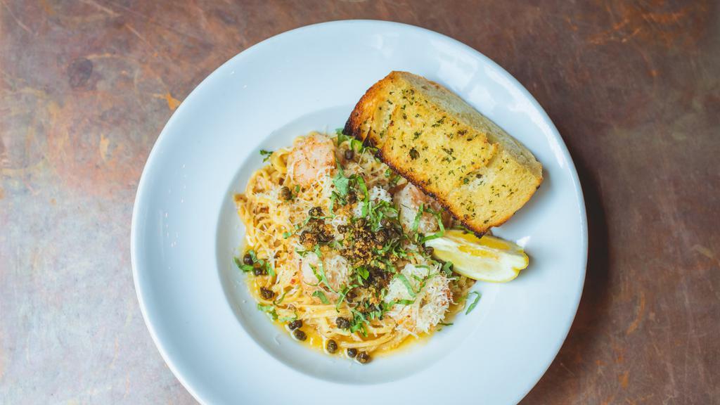 *Prawn Scampi (Gluten Intolerant) · With gluten free spaghetti, lemon, butter, garlic and crushed chilies topped with Parmesan and crispy capers. With gluten free baguette.