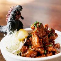Karaage (Japanese Fried Chicken) · Served with cabbage, lemon. Regular is served with spicy Aioli. Kabayaki is tossed in a swee...