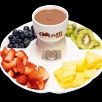Fruit And Dip Plate ( Includes Fondue Set ) · a variety of fruits served with a warm chocolate fondue
