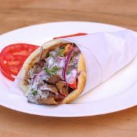 Gyro · Beef & lamb mix, house made tzatziki, red onions, tomatos, wrapped in greek pita bread.