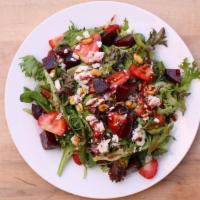 Beet Salad · Organic mixed greens, marinated beets, goat cheese, pistachios, & fresh strawberries ,dresse...
