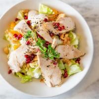 Chinese Chicken Salad · Sliced grilled chicken breast, romaine and iceberg topped with toasted cashews, sesame seeds...