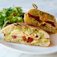Grilled Chicken Panini · Grilled chicken breast, sun-dried tomatoes, avocados, garlic basil Mayo and provolone cheese.