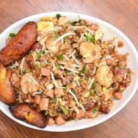 Arroz Frito 🥡 · Fried rice with shrimp, ham, pork, egg, green onions, bean sprouts and soy sauce. Served wit...