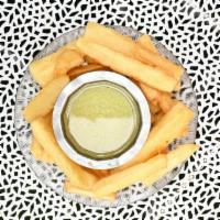 Yuca Frita 🥔🍟 · Yucca is a root vegetable like a potato.  Yucca Frita is steamed and then fried. We serve it...