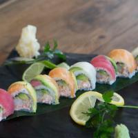 Black Tiger Rainbow Roll. · Shrimp tempura, avocado, tuna, salmon and yellowtail