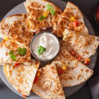 Carnitas Quesadilla (Pork) · Warm quesadilla filled with melted cheese and pulled pork, served with a side of guacamole, ...
