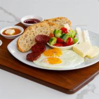 Mediterranean · eggs, caprese salad, (3) sliced soujouk sausage, kashar cheese, feta cheese & brie served ja...