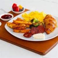 French · eggs, home fried potatoes, (3) oujouk sausage, croissant, sautéed / brussel sprouts & brie c...
