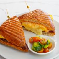 Breakfast Sandwich · grilled salami, melted five cheese, scrambled eggs & utopia sauce on ciabatta