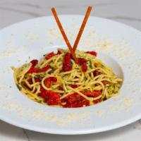 Spaghetti Aglio E Olio · spaghetti pasta, garlic, olive oil, sun-dried tomato, parmesan & parsley