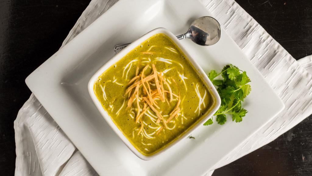 Crema De Chile Poblano · Gluten-free. Our signature soup with our signature flavor. Chile poblano and cilantro give this soup a distinctive, spicy flare.