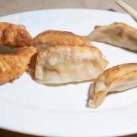 Pot Stickers (6Pc) · chicken and vegetable.
6 pieces