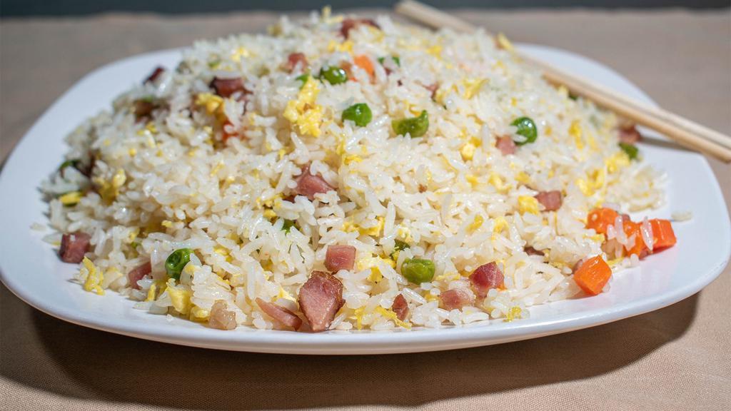 Pork Fried Rice · Please note that we do not use soy in fried rice, it will not be brown because there is no soy in it.