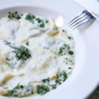 Ravioli Di Magro · Housemade pasta filled with ricotta and spinach with a tomato basil or mascarpone and fresh ...