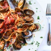 Tagliolini Cozze Vongole · Housemade thin pasta with mussels, clams and tomato broth.