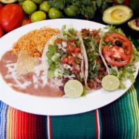 Two Tacos (Combo) · Two tacos with your choice of meat, a side of rice and beans.