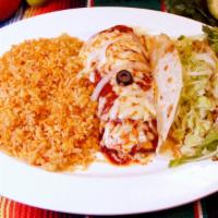 Enchilada & Taco Combo · Include, beans, rice and salad.