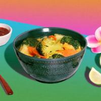 Yellow Curry · Turmeric and coconut milk curry with your choice of tofu or vegetables.