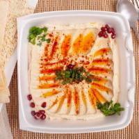 #2. Hummus · Garbanzo beans, fresh garlic and tahini blended together and topped with olive oil and sumac.