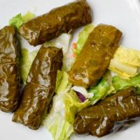 #6. Grape Leaves · Rice with parsley, onions, lemon juice, olive oil wrapped in grape leaves.