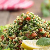 Tabbouleh · Tabbouleh is a Levantine vegetarian salad made mostly of finely chopped parsley, with tomato...