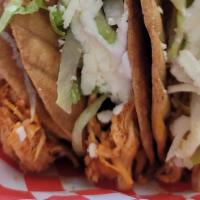 #2. Combo Tacos Dorados With Rice And Beans · 2pcs Tacos Dorados your choice of meat with sour cream,  lettuce, and queso fresco. And a si...